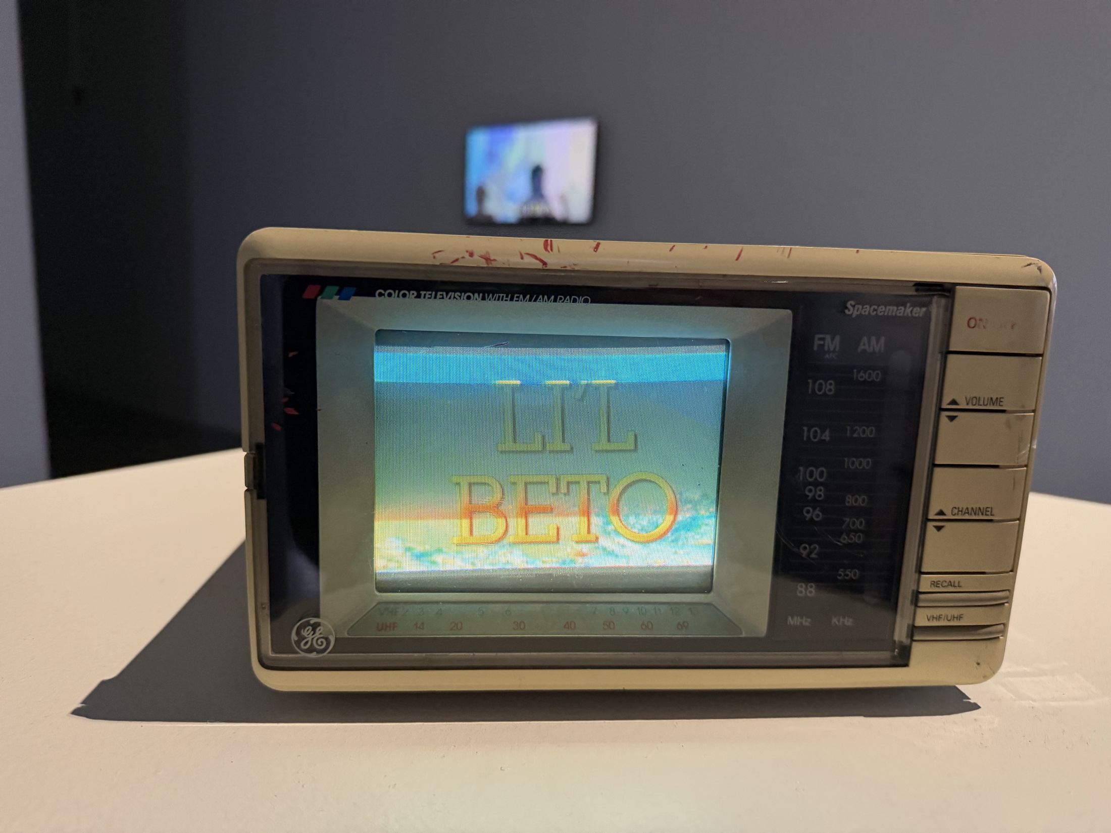 Omar Lopex’s Li’l Beto playing on a GE Spacemaker television.
